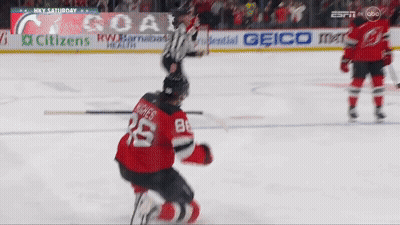 Hockey Player Kneeling With Goal Banner GIF