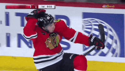 Hockey Player Lying On Ice Score 0-1 GIF