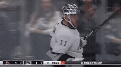 Hockey Player Number 11 Holding Stick GIF