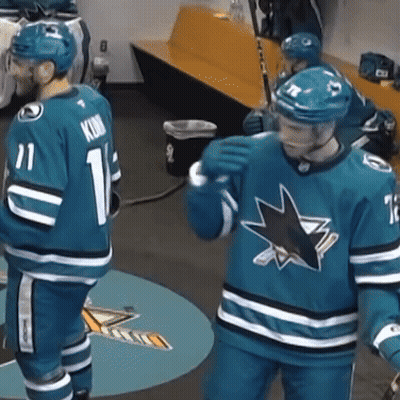 Hockey Player Number 11 Next To Number 16 GIF