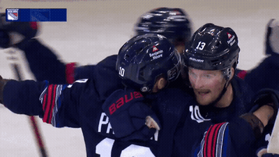 Hockey Player Number 13 Hugging Another Player GIF