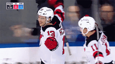 Hockey Player Number 13 Standing On Ice GIF