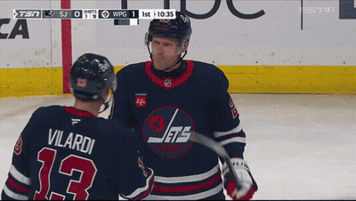 Hockey Player Number 13 Talking To Another Player GIF