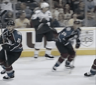 Hockey Player Number 2 Being Chased GIF