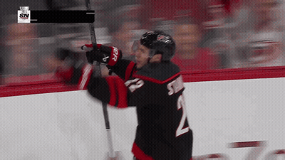 Hockey Player Number 2 Holding Stick GIF