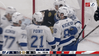 Hockey Player Number 21 Hugging Another Player GIF