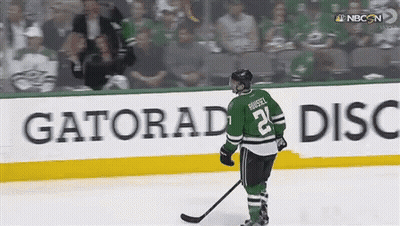 Hockey Player Number 21 Standing On Ice GIF
