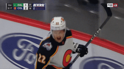Hockey Player Number 22 Holding Stick GIF