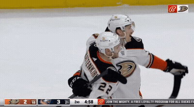 Hockey Player Number 22 Hugging GIF