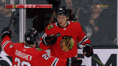Hockey Player Number 23 Congratulated GIF