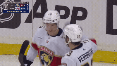 Hockey Player Number 23 Hugging Another Player GIF