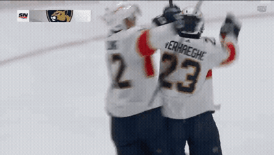 Hockey Player Number 23 Hugging Another Player GIF