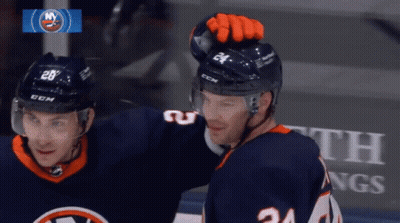 Hockey Player Number 24 Standing Next To Another Player GIF
