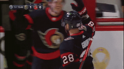 Hockey Player Number 28 Hugging Another Player GIF