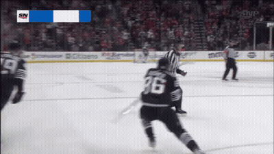 Hockey Player Number 36 Skating on Ice