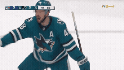 Hockey Player Number 4 Holding Stick GIF