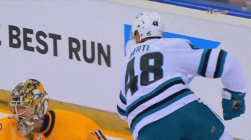 Hockey Player Number 48 Running GIF