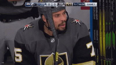 Hockey Player Number 5 Sitting In Dugout GIF