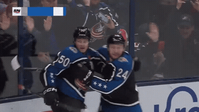Hockey Player Number 50 Hugging Another Player GIF