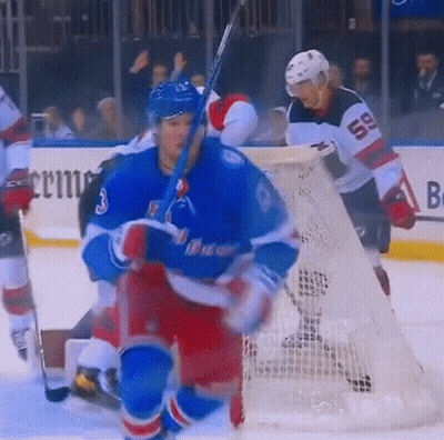 Hockey Player Number 59 Standing In Front Of Net GIF