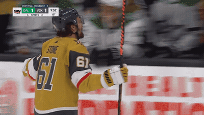 Hockey Player Number 61 Holding Hockey Stick GIF