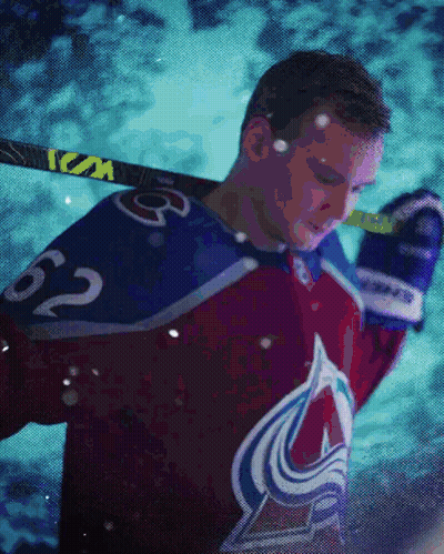 Hockey Player Number 62 Holding Stick GIF
