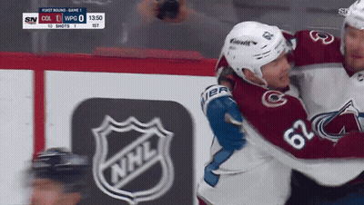 Hockey Player Number 62 Hugging Another Player GIF
