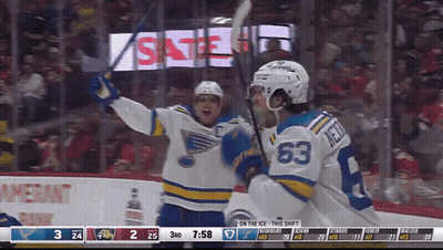 Hockey Player Number 63 Celebrates Goal GIF