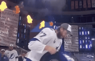 Hockey Player Number 7 In Front Of Fire GIF