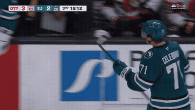 Hockey Player Number 71 Holding Stick GIF