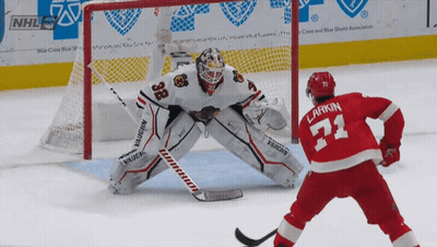 Hockey Player Number 71 In Front Of Goalie GIF