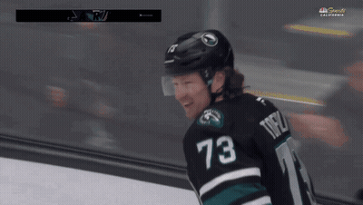 Hockey Player Number 73 Holding Stick GIF