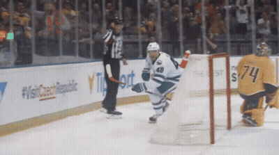 Hockey Player Number 74 on Ice