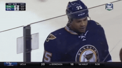 Hockey Player Number 75 On Helmet Standing On Ice GIF