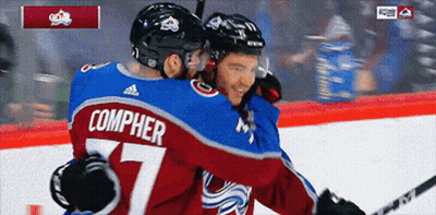 Hockey Player Number 77 Hugging Teammate GIF