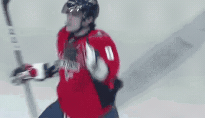 Hockey Player Number 8 Holding Hockey Stick GIF