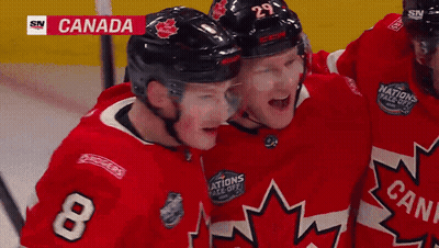 Hockey Player Number 8 Hugging Another Player GIF
