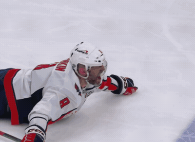 Hockey Player Number 8 Lying On Ice GIF