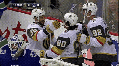 Hockey Player Number 80 Hugged By Two Players GIF