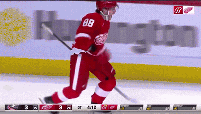 Hockey Player Number 88 Skating on Ice