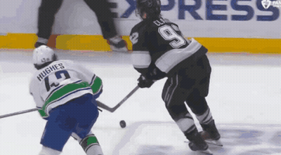 Hockey Player Number 9 Being Chased GIF
