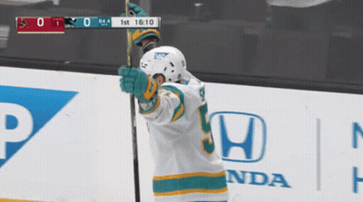 Hockey Player Number 9 Holding Stick GIF