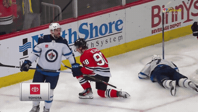 Hockey Player Number 9 Talking To Another Player GIF