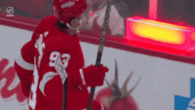 Hockey Player Number 93 Holding Stick GIF