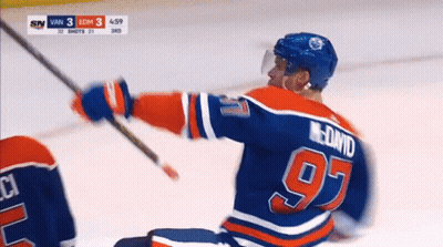 Hockey Player Number 97 Holding Stick GIF