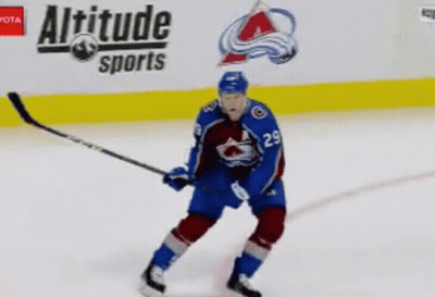 Hockey Player On Ice In Front Of Altitude Sports GIF