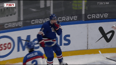 Hockey Player On Ice In Front Of Crave Sign GIF
