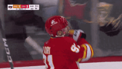 Hockey Player Red Jersey Number 11 GIF