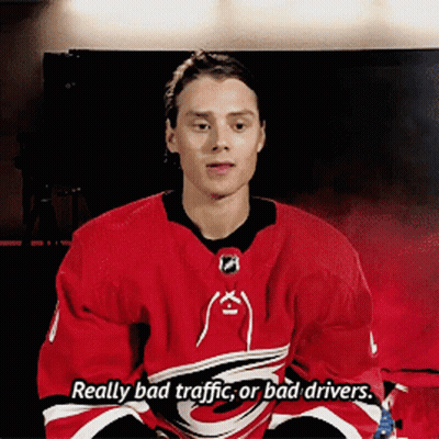 Hockey Player Red Jersey Saying Really Bad Traffic GIF