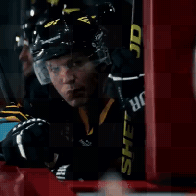 Hockey Player Sitting On Bench GIF